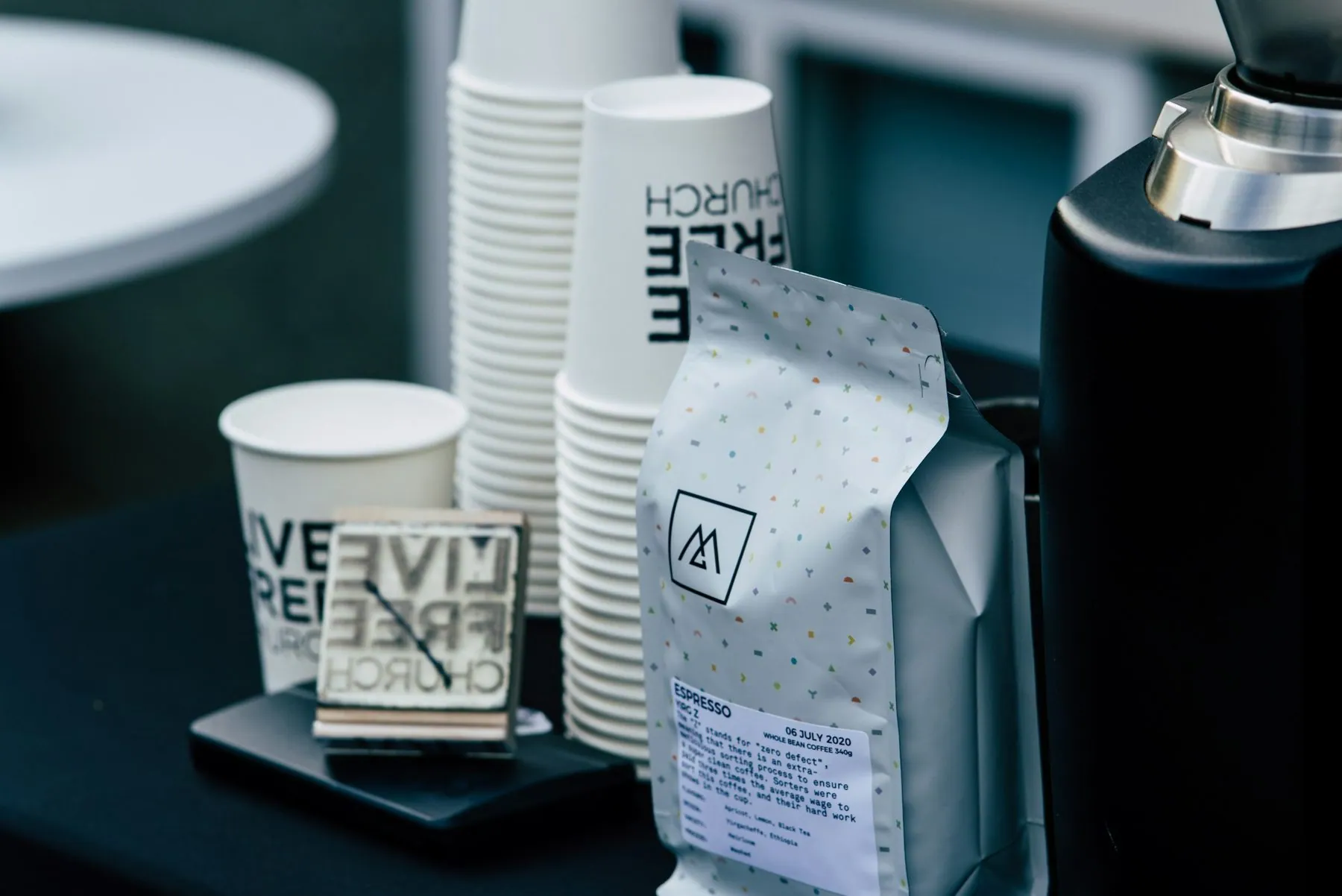 Coffee beans and paper cups.
